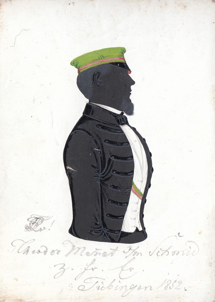 Theodor Mennet wurde am 17. Juli 1828 in Riedlingen geboren. Sein Vater war der Posthalter Autbert Mennet (1803-1866), seine Mutter dessen Ehefrau Maria Anna Stoß. Am 14. November 1846 immatrikulierte sich Mennet als stud. iur. in Tübingen und wurde bei Franconia aktiv, in die er 1847 recipiert wurde und bei der er einmal Senior war. Später war er als techn. Adjunkt der Zuckerfabrik in Alt Benateck tätig, wo er 1899 starb. Die Silhouette ist gewidmet "Theodor Men̅et s/m Schmid z. fr. Er. Tübingen 1852." Archiv des Corps Franconia Tübingen, Silhouettenalbum des Karl Schmidt