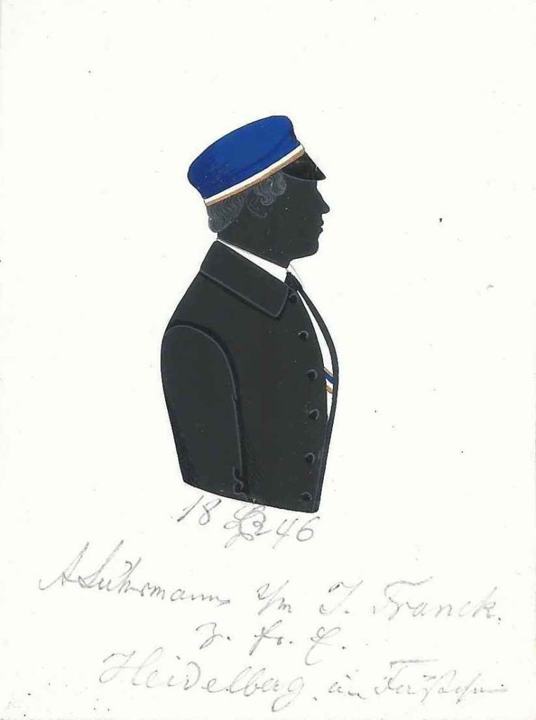 Friedrich Albert Lührmann kam am 12. Oktober 1825 in Dortmund zur Welt und wurde am 13. November daselbst evangelisch getauft. Seine Eltern waren Heinrich Johann Diederich Lührmann (1788-1839) und dessen Ehefrau Gerdrut Dorothea Hammacher (1788-1865). Nach dem Abitur immatrikulierte sich Lührmann am 2. Mai 1846 als stud. iur. an der Universität Bonn und wurde Mitglied der Saxo-Rhenania, in die er noch im selben Jahr rezipiert wurde. Nach dem Studium heiratete Lührmann am 18. August 1863 in Lüdenscheid Marie Berker. Über seinen weiteren Lebensweg ist bislang nichts festzustellen gewesen. Die Silhouette ist gewidmet „18 [Z!] 46 – ALührmann s/m J. Franck. – z. fr. E. – Heidelberg im Fäßchen“. Sammlung Robert Soppa Saxoniae Konstanz