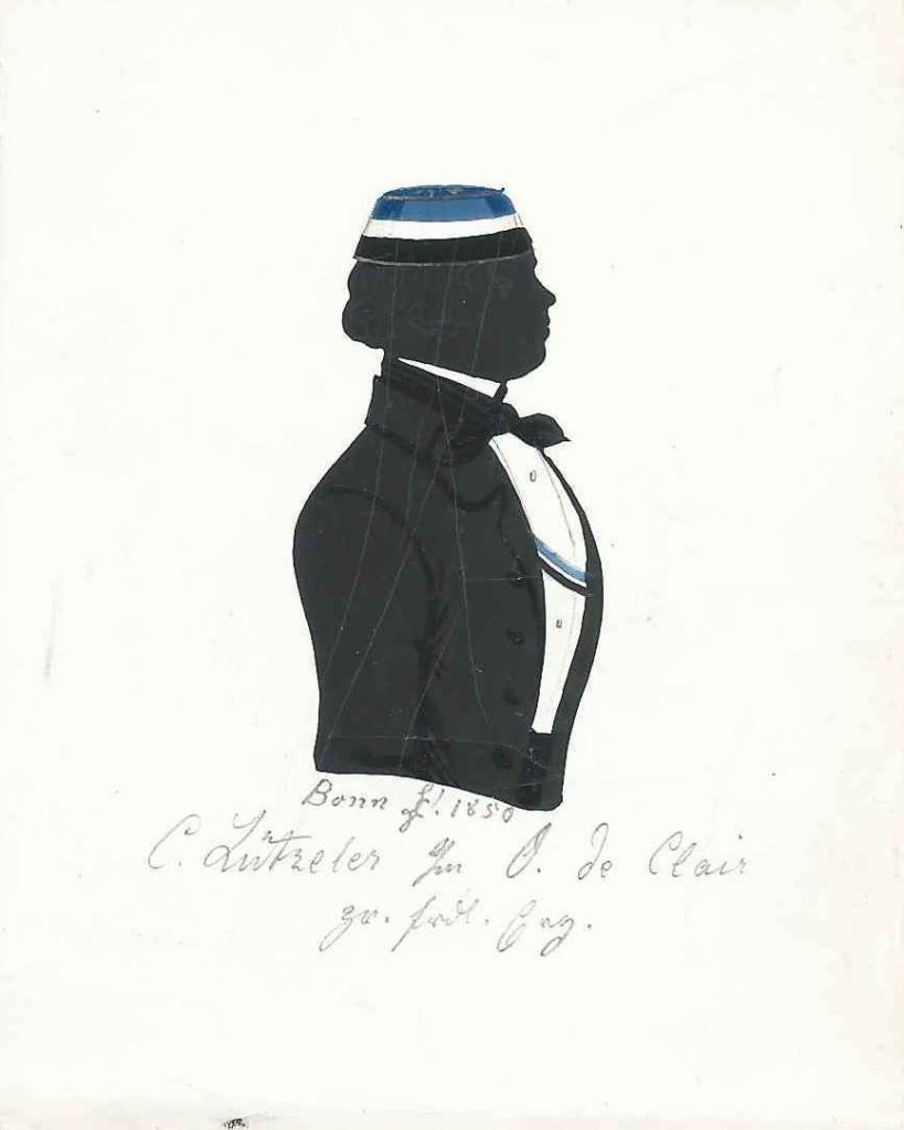Wilhelm Carl August Lützeler kam am 9. Juli 1828 in Elberfeld als Sohn des Notars Johann Franz Heinrich Lützeler und dessen Ehefrau Amalia Elisabeth Lenzen zur Welt und wurde katholisch getauft. Nach dem bestandenen Abitur immatrikulierte er sich am 25. Oktober 1847 als stud. iur. an der Universität Bonn und wurde bei der Saxonia aktiv, die erst kurz zuvor wieder als Corps anerkannt wurde. Im folgenden Jahr wurde er rezipiert und war zweimal Consenior und zweimal Senior. Später wurde er zum Ehrenmitglied des Corps ernannt. Nach dem Studium trat Lützeler in den Staatsdienst ein und war als Königlicher Staatsprokurator tätig, als er am 2. April 1869 in Trier die von dort stammende Josephine Henriette Müller (geb. 1836) heiratete. Er stieg zum Landgerichtspräsidenten auf und heiratete nach dem Tod seiner ersten Frau ein weiteres Mal am 23. März 1892 in Frankfurt am Main Emma Emilie Lemme (geb. 1863). Lützeler starb 1902 in Köln. Die Silhouette ist gewidmet „Bonn [Z!] 1850 – C. Lützeler s/m O. de Clair – zr. frdl. Erg.“ Sammlung Robert Soppa Saxoniae Konstanz